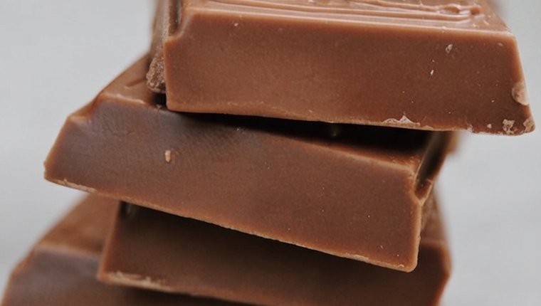 Stacked milk chocolate pieces